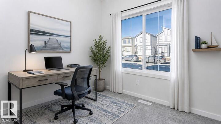 Property Photo: 7468 Klapstein Crescent SW AB T6W 5N8