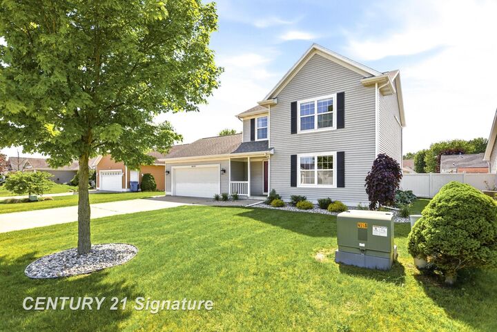 Property Photo:  8433 Waxwing Drive  MI 48623 