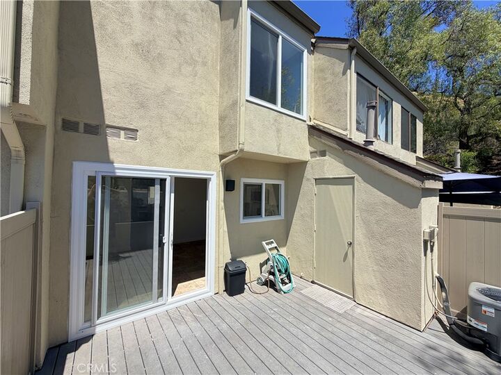 Property Photo: 245 N Singingwood Street 11 CA 92869