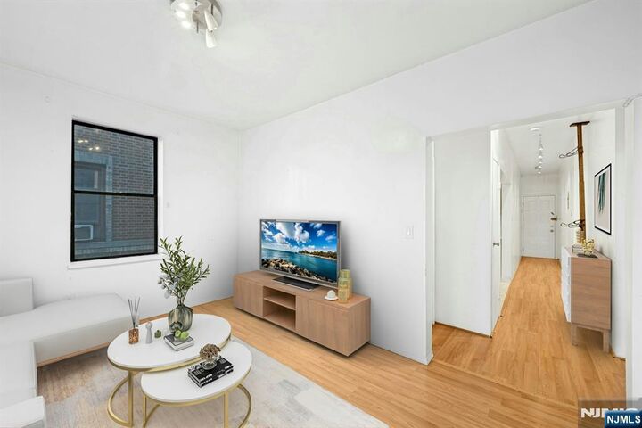 Property Photo:  6601 Bdway E7  NJ 07093 