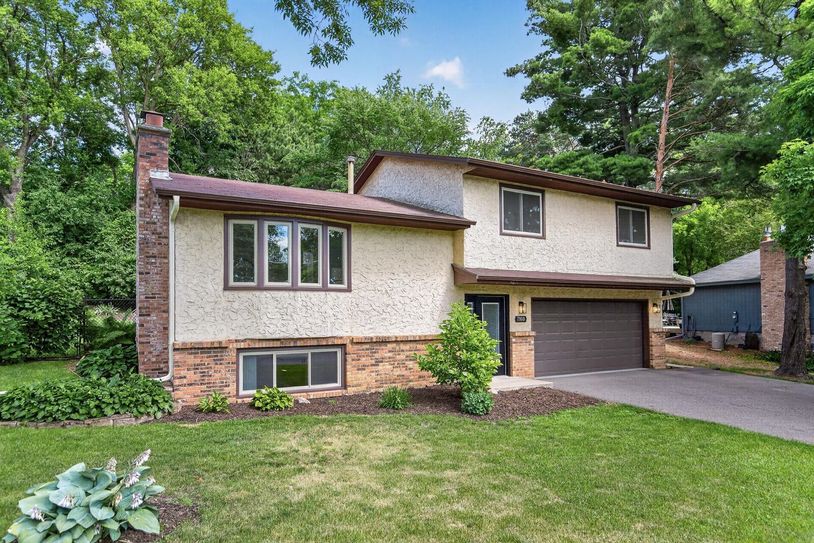 Property Photo: 7160 Maplewood Drive MN 55311