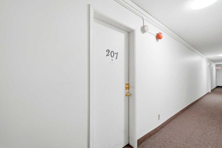 Property Photo: 6464 Travois Crescent NW 207 AB T2K 3S9