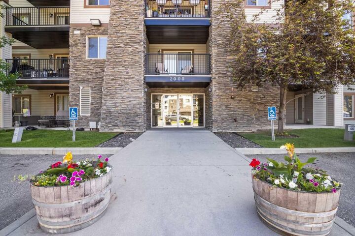 Property Photo:  8 Bridlecrest Drive SW 2431  AB T2Y 0H7 