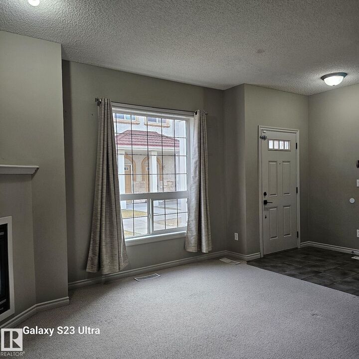 Property Photo: 13825 155 Avenue NW 99 AB T6V 0B8
