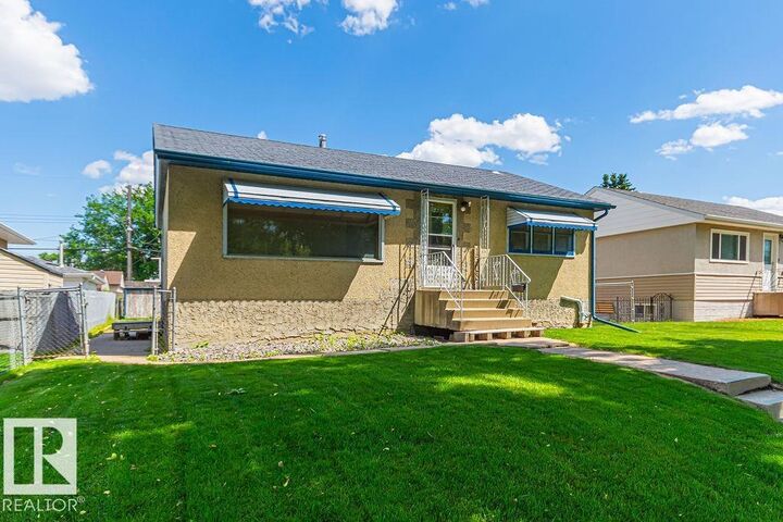 Property Photo:  13031 63 Street NW  AB T5A 0W5 