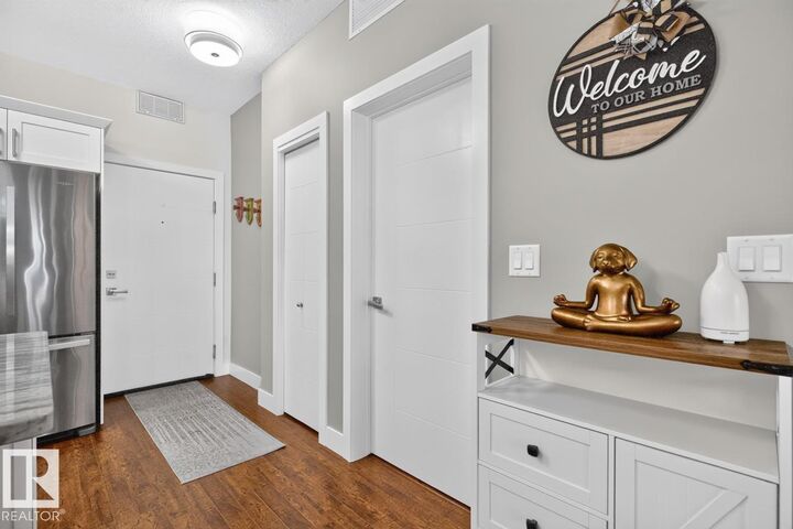 Property Photo:  111 Festival Way 105  AB T8A 4Y4 