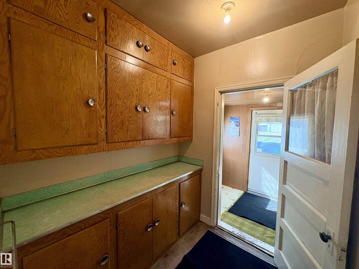 Property Photo:  5103 50 Avenue  AB T9N 2G9 