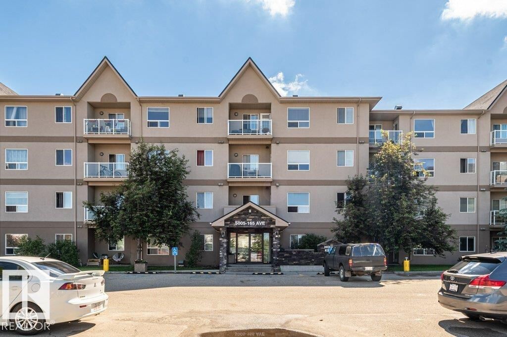 Property Photo:  5005 165 Avenue NW 214  AB T5Y 0L8 
