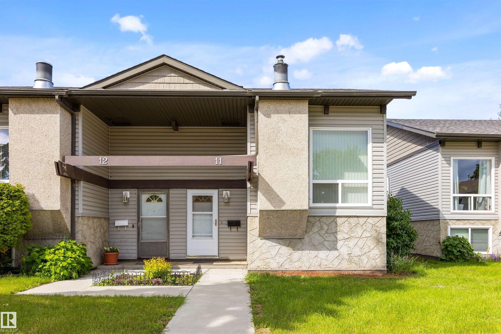 Property Photo: 11 Northwoods Village NW AB T5X 1T2