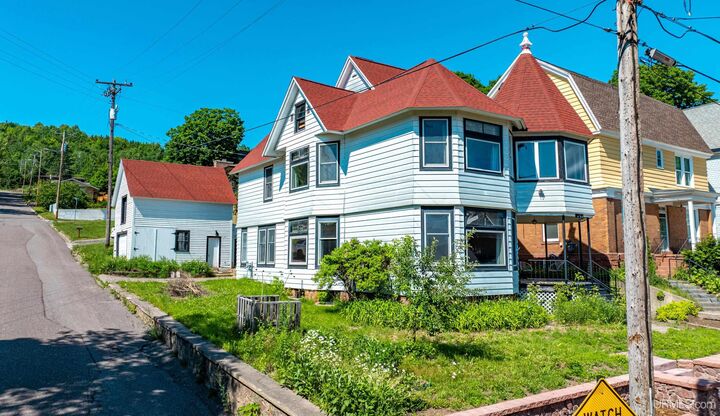 Property Photo:  202 Harris Avenue  MI 49930 