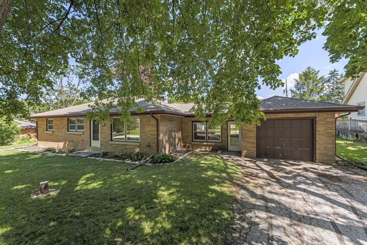 Property Photo:  6630 W Holmes Ave  WI 53220 