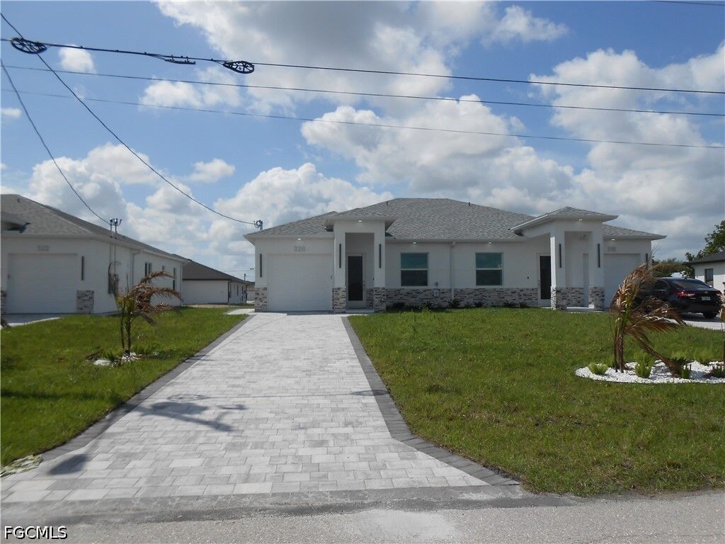 Property Photo:  320 Poplar Street  FL 33974 