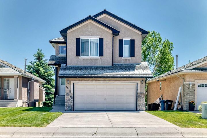 Property Photo:  1210 Harvest Hills Drive NE  AB T3K 5B3 