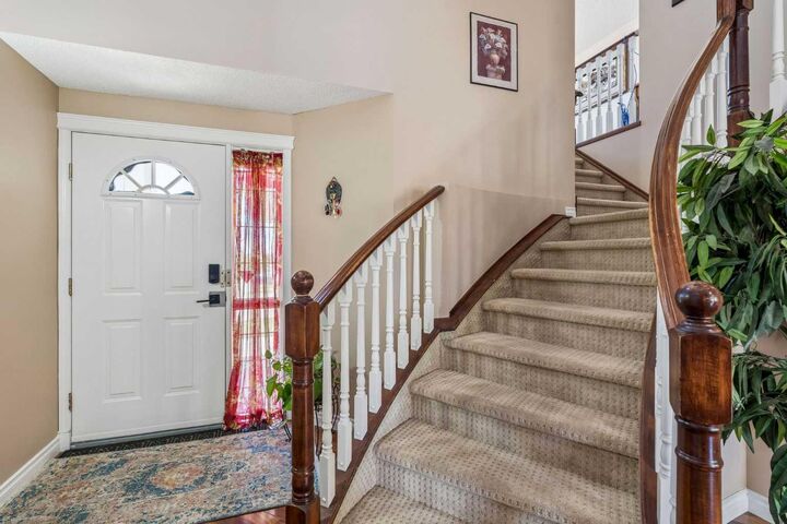 Property Photo:  86 Tuscany Ravine Road NW  AB T3L 2R9 