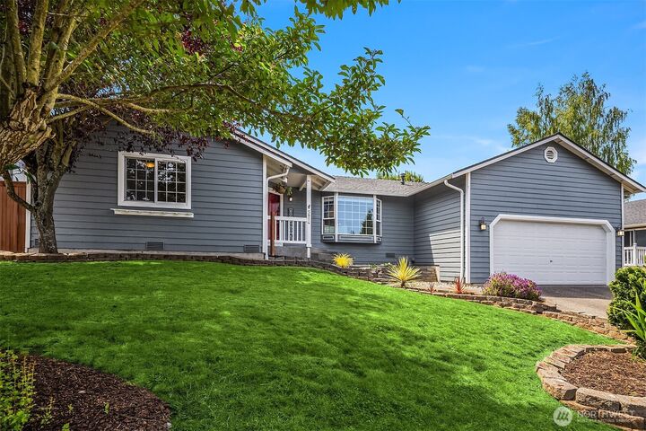 Property Photo:  5814  12th Avenue W  WA 98203 