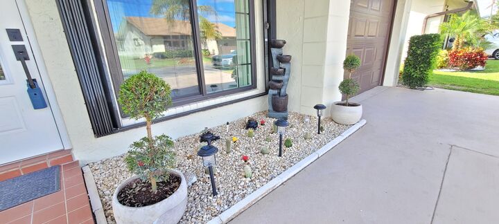Property Photo:  6209 Olivewood Circle  FL 33463 