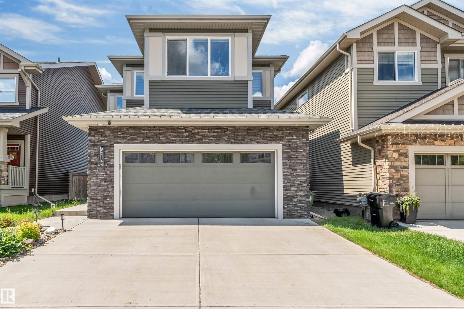 Property Photo:  8516 216 Street NW  AB T5T 4W2 