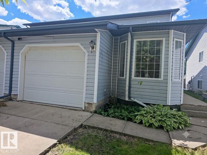 Property Photo:  12237 140A Avenue NW  AB T5X 6E6 