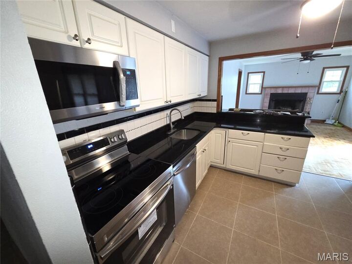 Property Photo:  10054 Hedge Drive  MO 63137 