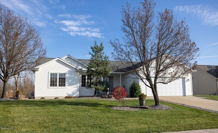Property Photo:  7058 Shady Knoll Drive SE  MI 49316 