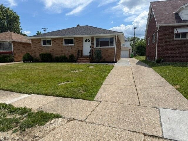 Property Photo:  907 E 216th Street  OH 44119 