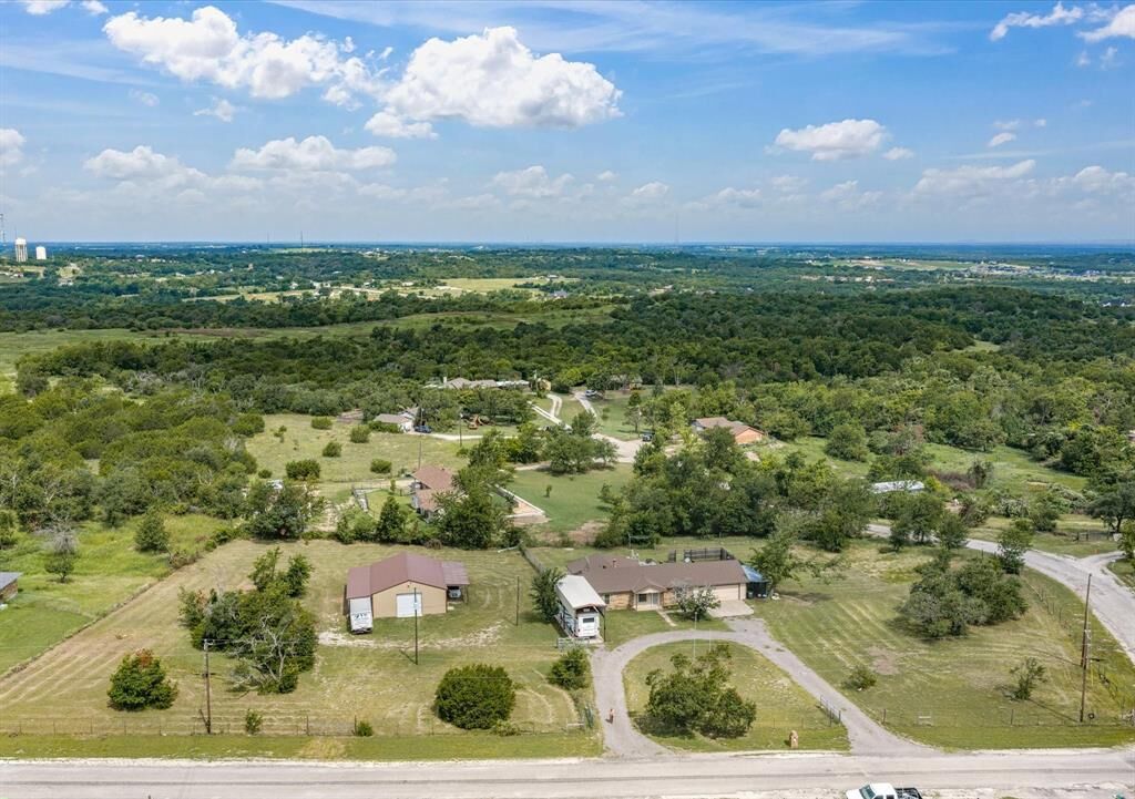 Property Photo: 704 Land Of Goshen Drive TX 76082