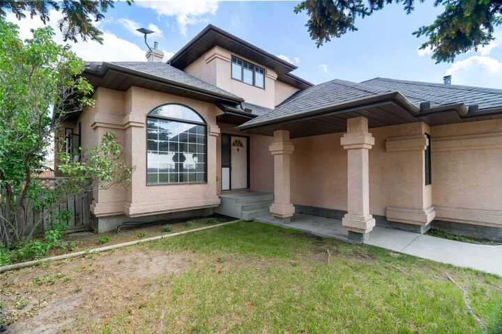 Property Photo:  210 McKinnon Drive  AB T0J 0M0 