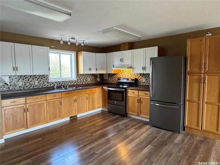 Property Photo:  210 Bouvier Crescent  SK S0M 0A1 