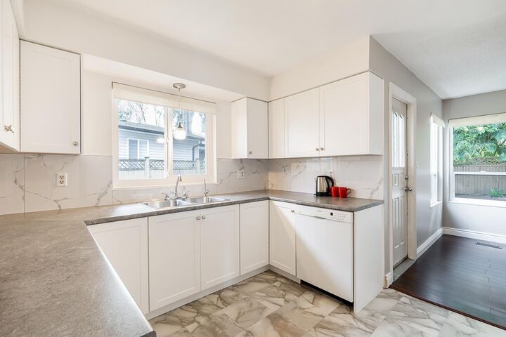 Property Photo:  12946 66A Avenue  BC V3W 8Z7 
