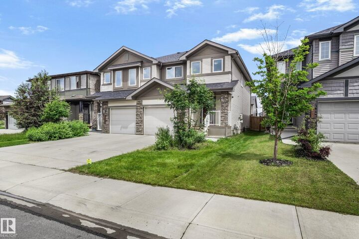 Property Photo:  809 Cavanagh Heath SW  AB T6W 3Y1 