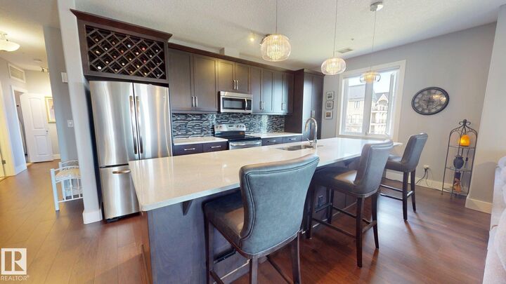 Property Photo: 6079 Maynard Way NW 355 AB T6R 0S4