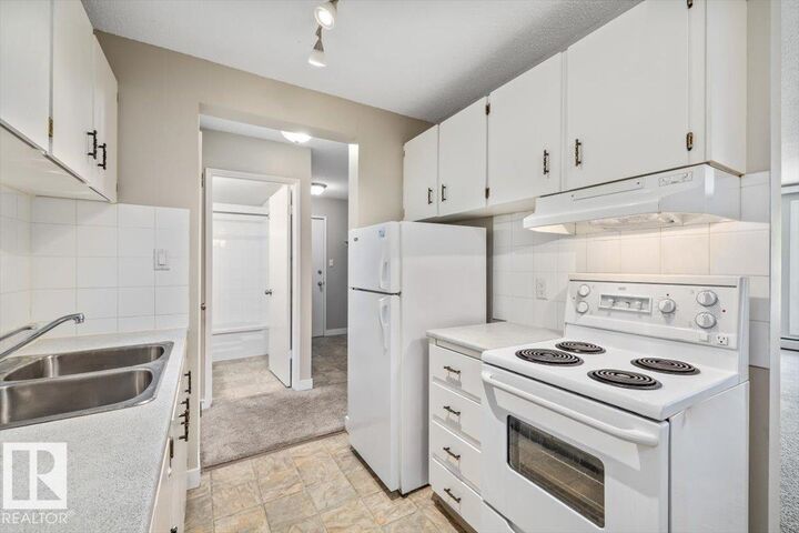 Property Photo: 10330 113 Street NW 306 AB T5K 1P6