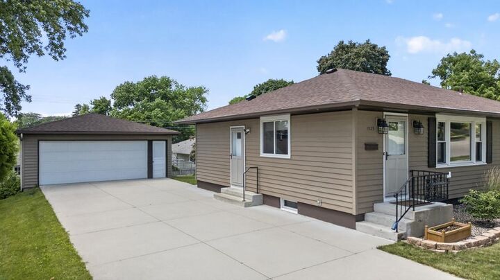 Property Photo:  1525 11th Avenue NE  MN 55906 