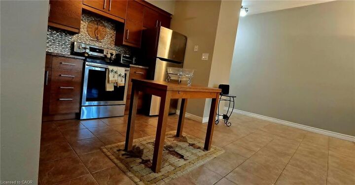 Property Photo: 10 Woodman Drive S 108 ON L8K 4E1