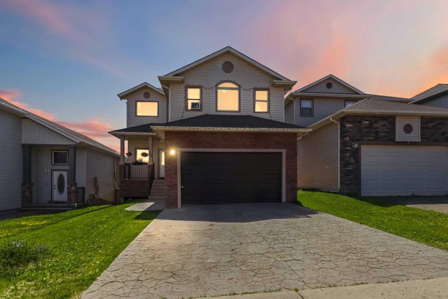 Property Photo: 205 Gravelstone Way AB T9K 0S9