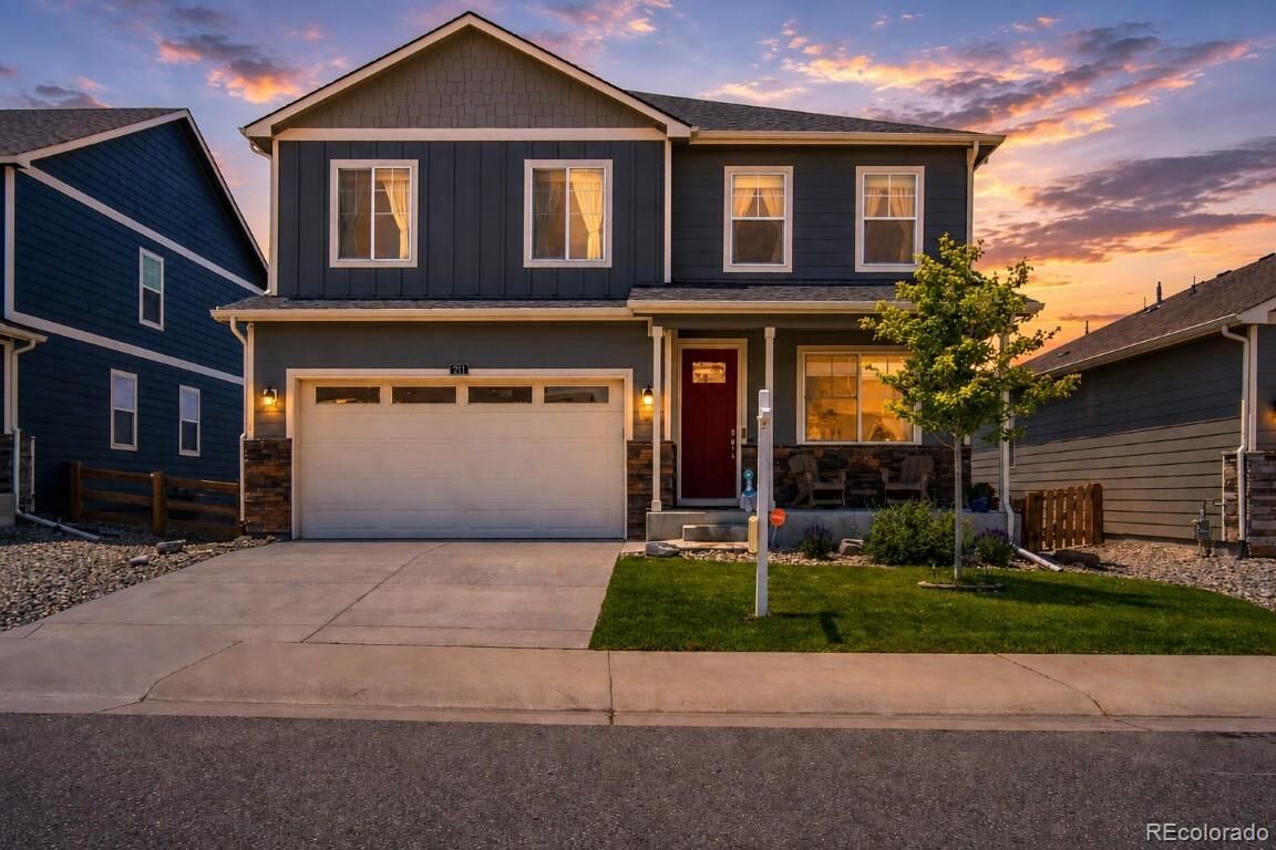 Property Photo:  211 Fox Street  CO 80102 