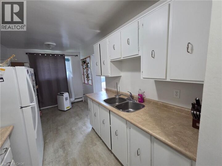 Property Photo:  527 Parkside Drive 11  ON N2L 4X7 