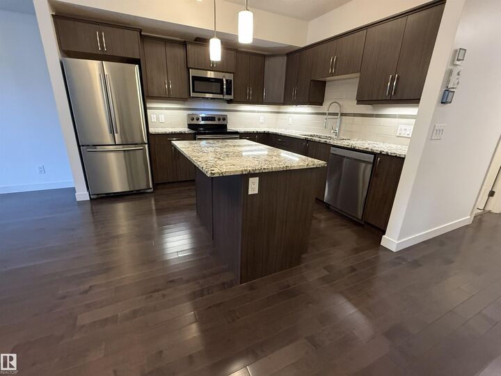Property Photo:  10523 123 Street NW 119  AB T5N 1N9 