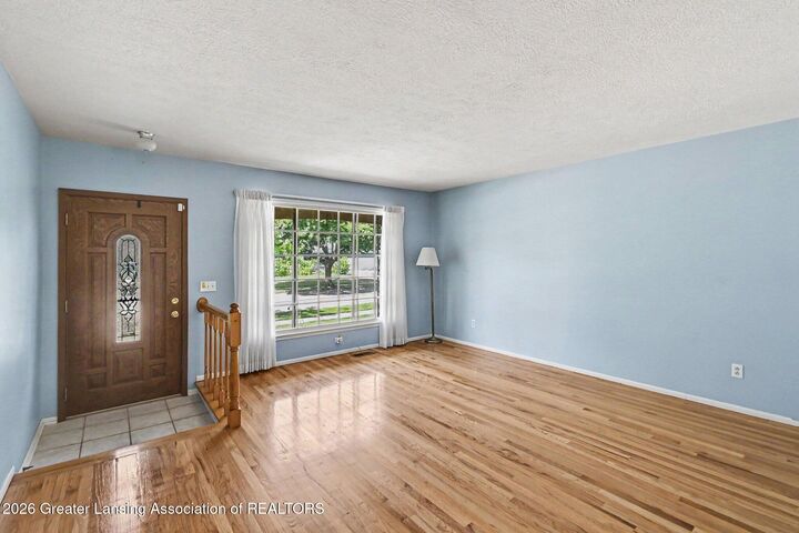 Property Photo:  1003 Blanchette Drive  MI 48823 
