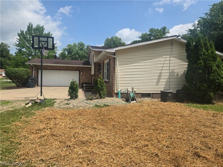 Property Photo: 2042 Coit Drive NW OH 44485