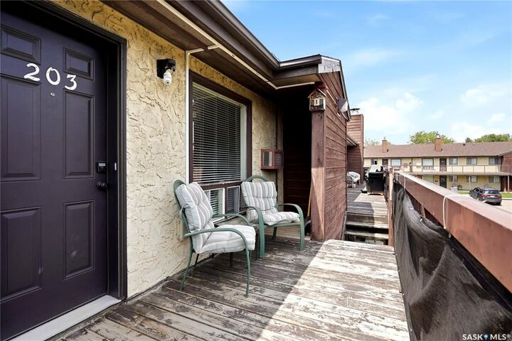 Property Photo:  15 Alport Crescent 203  SK S4R 8C6 