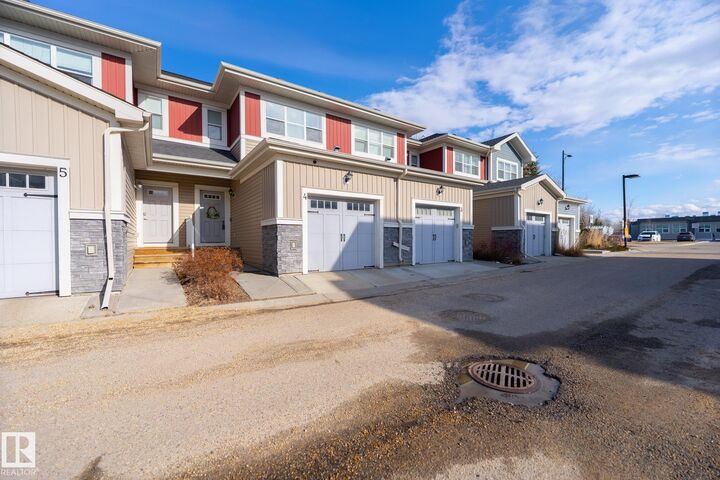 Property Photo: 3710 Allan Drive SW 4 AB T6W 2C4
