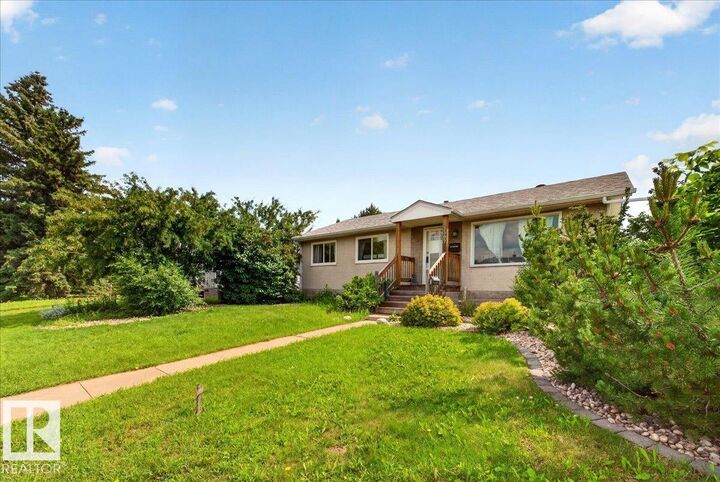 Property Photo:  13307 122 Street NW  AB T5L 0G4 
