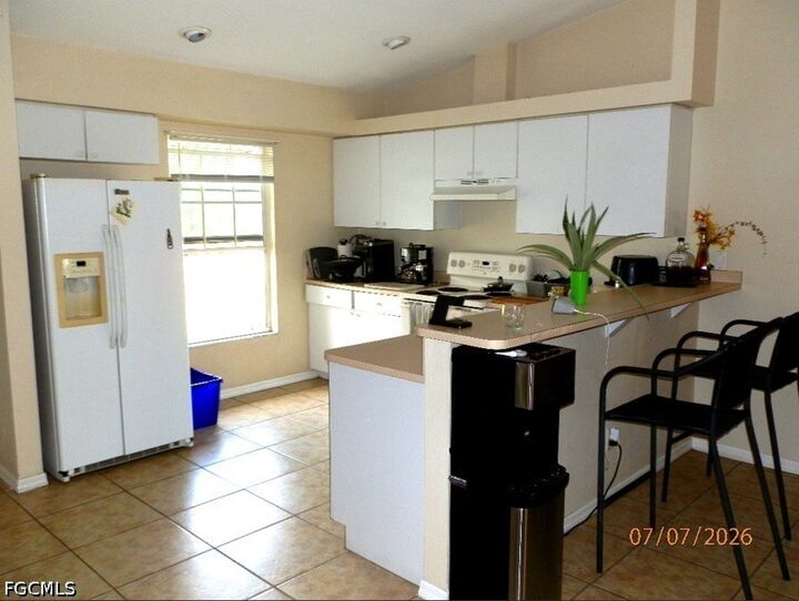 Property Photo:  2410 NE 6th Street  FL 33909 