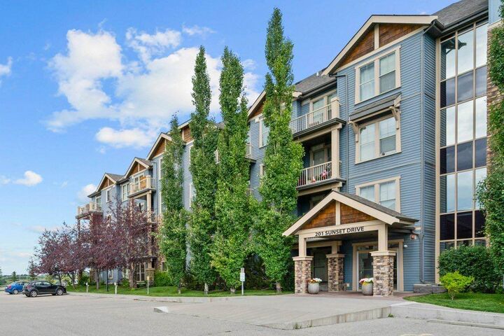 Property Photo: 201 Sunset Drive 304 AB T4C 0H5