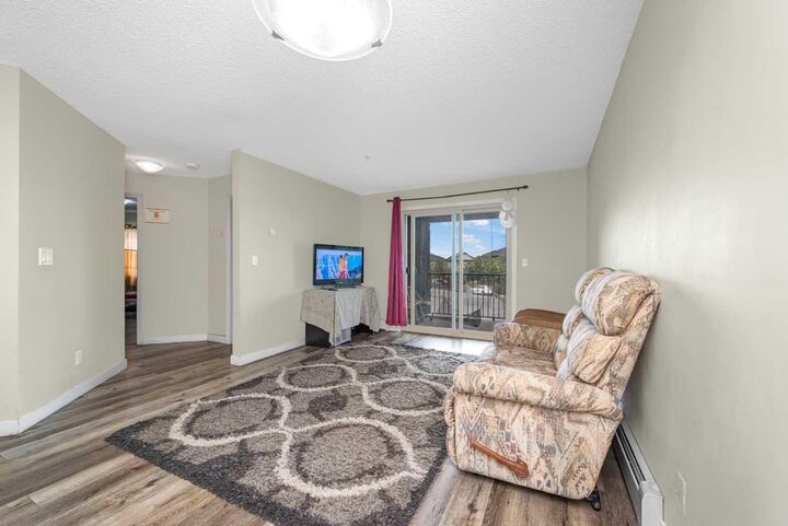 Property Photo: 5 Saddlestone Way NE 207 AB T3J 0S2