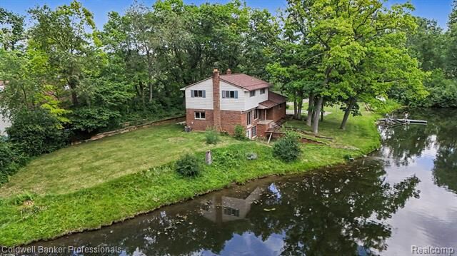 Property Photo: 8965 Sherwood Drive MI 48350