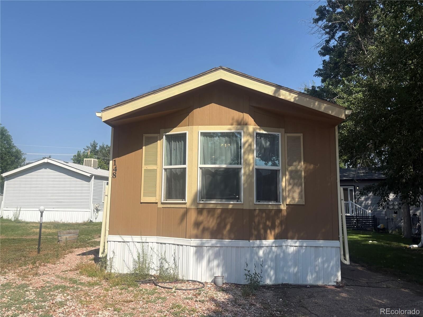 Property Photo:  3650 S Federal Boulevard  CO 80110 