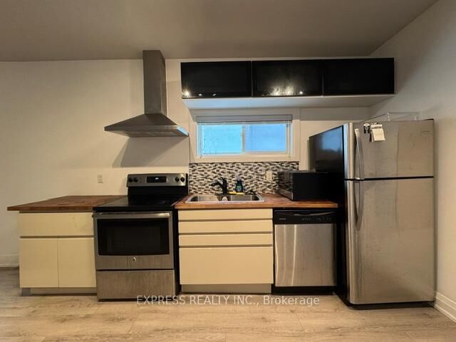 Property Photo:  467 Keele Street Main  ON M6N 3E1 