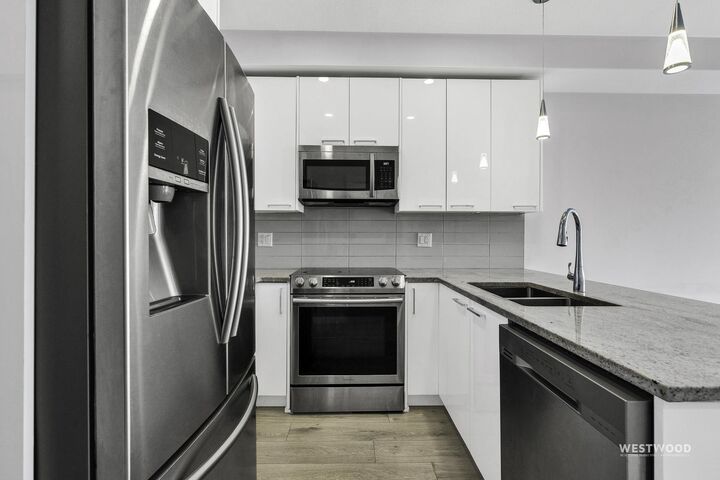 Property Photo: 20696 Eastleigh Crescent 210 BC V3A 0M3